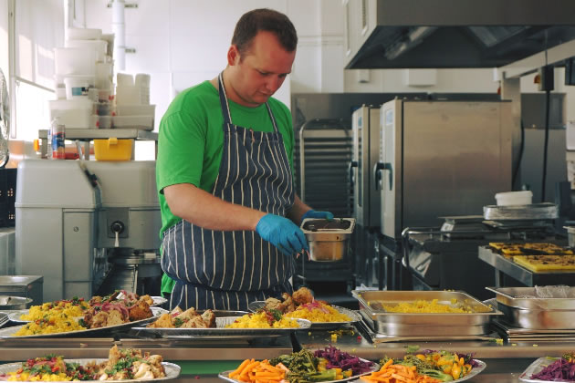 A chef from the Felix Project prepares meals 