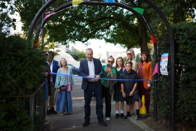 Andy Slaughter MP cutting the ribbon at Tunnels of Hope 2 