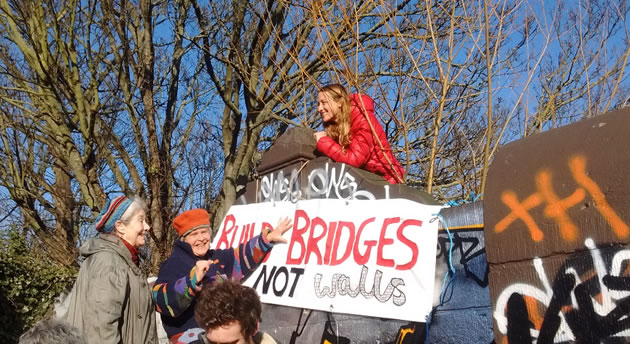image of banner saying build Bridges Not walls