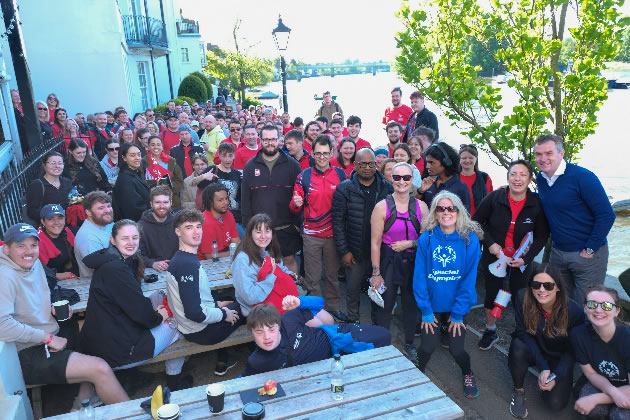 The walkers prepare to depart on 20 mile walk from the Chiswick pub 