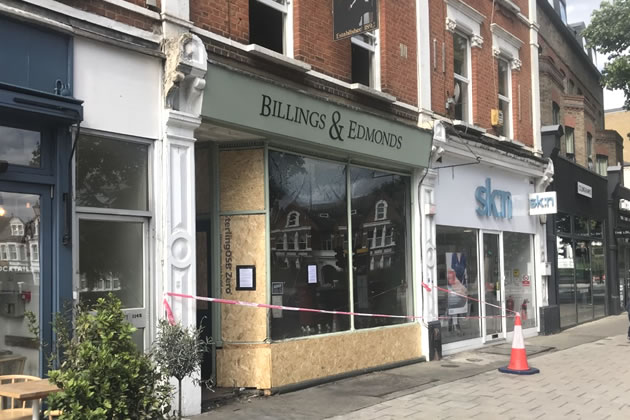 Billings and Edmonds in Chiswick High Road after the fire 