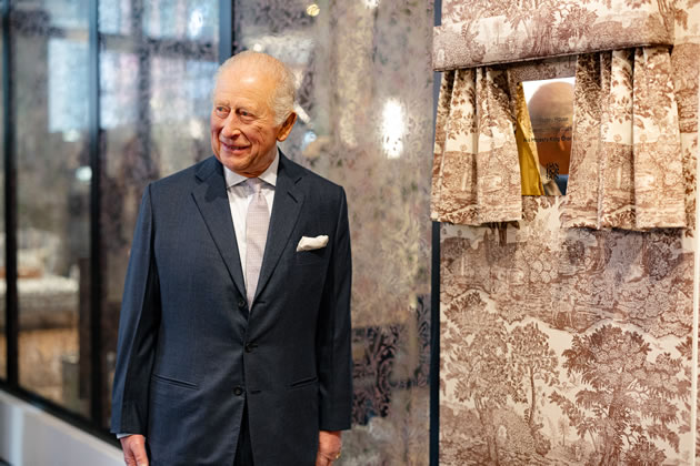 The King unveiled a commemorative plaque &mdash; revealed from behind a curtain made from the collection's own 'Highgrove Toile' fabric