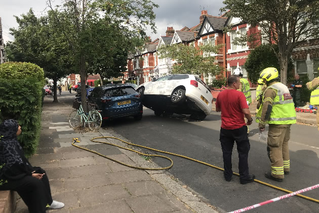 The car is on St Albans Avenue near the junction with Speldhurts Road 