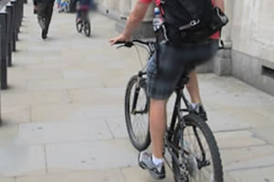 cyclist on pavement