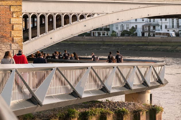 Pupils from Chiswick School were among the first to cross the opened walkway 