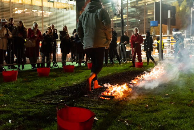A firewalk raised over £1,000 for local charity