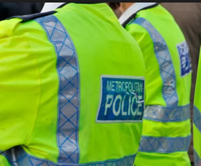 picture of policemen wsearig high vis vests 