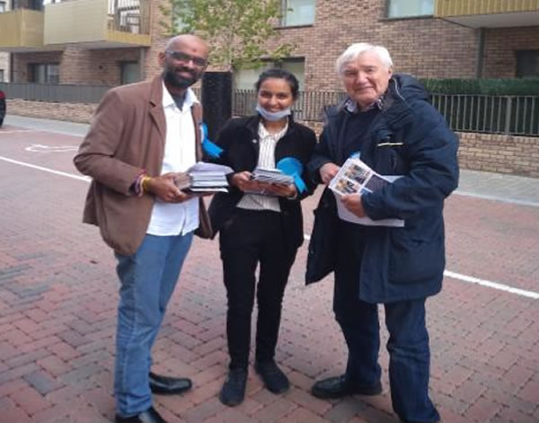 Jinesh Patel and Jesal Patel in Hounslow East, with the group Leader