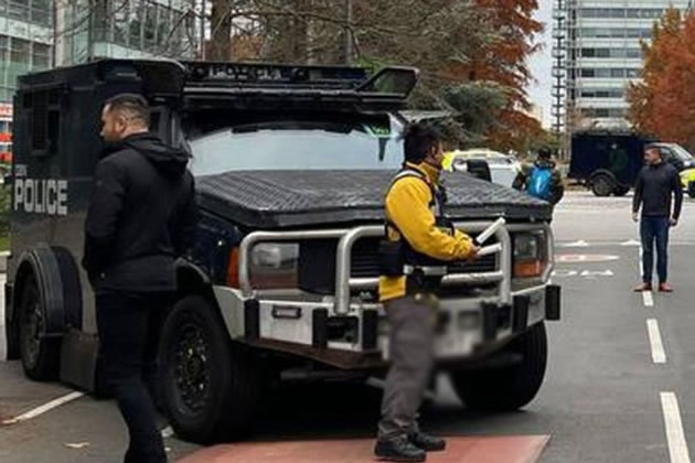 An armoured police van at Chiswick Business Park