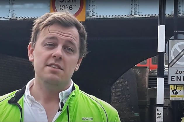 Peter Mason talking to camera by the Fisher's Lane underpass 