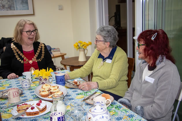 Mayor of Hounslow Karen Smith chats to guests at the tea party 