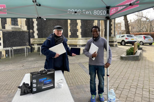 Collecting second hand lap tops on Turnham Green with Cllr Macgregor