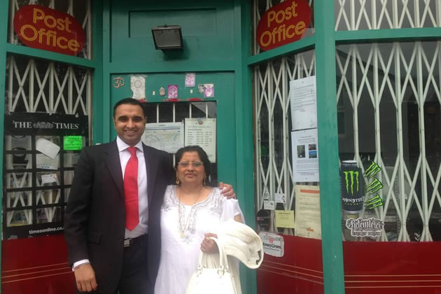 Mrs Joshi with her son outside the Post Office