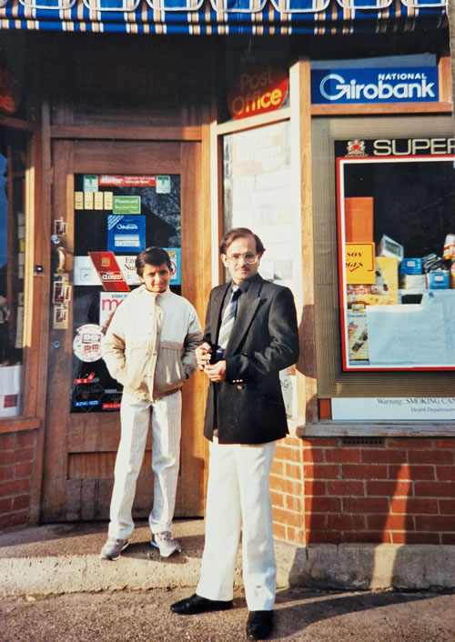 Milan with his father outside the office