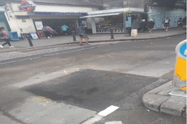 Working surface back in place over a twenty-foot hole, back filled and repaired in record time (thanks to the good weather and their expertise) by the Wimbledon based Cappagh Civil Engineering Group 