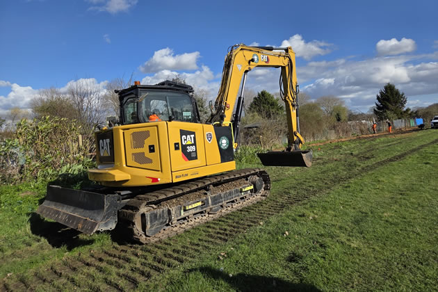 9-tonne excavator from Practicality Brown, contractors for Thomas's School removing invasive bamboo