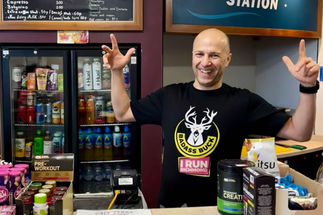 Eric behind the counter at his cafe.