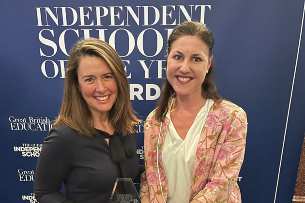 Senior Deputy Head (Pastoral) Rebecca Irwin and Head of Junior School Kate Bevan with the award