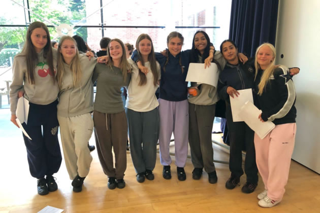 Notting Hill & Ealing High School students with their results 