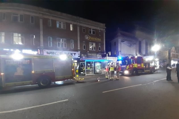 Firefighters tackle the blaze on South Road.