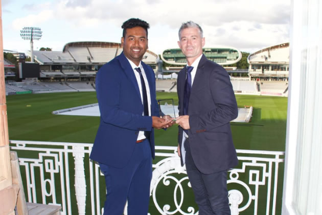 Tanvir Ahamed receiving his award in the pavilion at Lords 