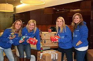 Douglas & Gordon Staff pack hampers for children