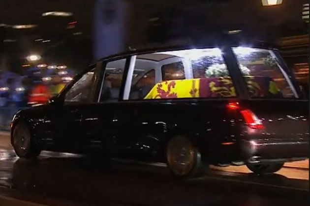 The state hearse was lit up inside to allow the coffin to be seen 