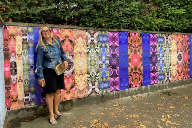 Jo Holland with her kaleidoscopic mural 