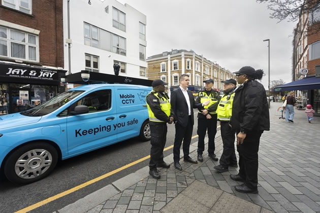 Council leader Simon Hogg (second left) talks to neighbourhood wardens.